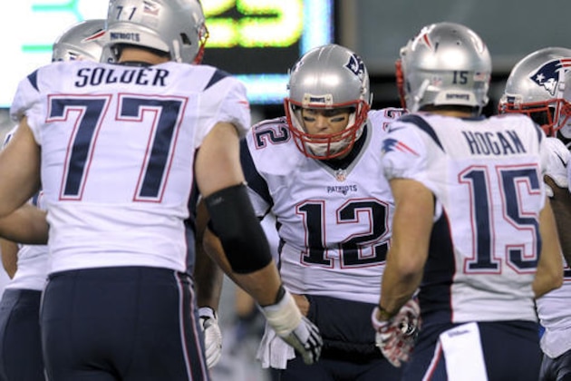 New England Patriots quarterback Tom Brady (12) huddles with teammates during the second quarter of an NFL football game against the New York Jets, Sunday, Nov. 27, 2016, in East Rutherford, N.J. (AP Photo/Bill Kostroun)