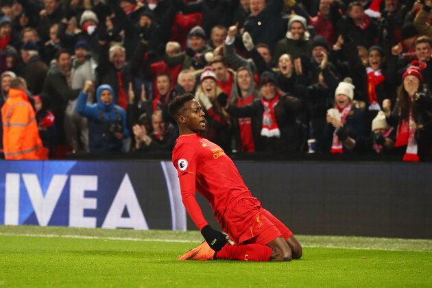 LIVERPOOL, ENGLAND - NOVEMBER 26:  Divock Origi of Liverpool celebrates scoring the opening goal during the Premier League match between Liverpool and Sunderland at Anfield on November 26, 2016 in Liverpool, England.  (Photo by Clive Brunskill/Getty Images)