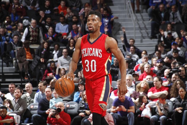 AUBURN HILLS, MI - FEBRUARY 21: Norris Cole #30 of the New Orleans Pelicans handles the ball during the game against the Detroit Pistons on February 21, 2016 at The Palace of Auburn Hills in Auburn Hills, Michigan. NOTE TO USER: User expressly acknowledges and agrees that, by downloading and/or using this photograph, User is consenting to the terms and conditions of the Getty Images License Agreement. Mandatory Copyright Notice: Copyright 2016 NBAE (Photo by B. Sevald/Einstein/NBAE via Getty Images)