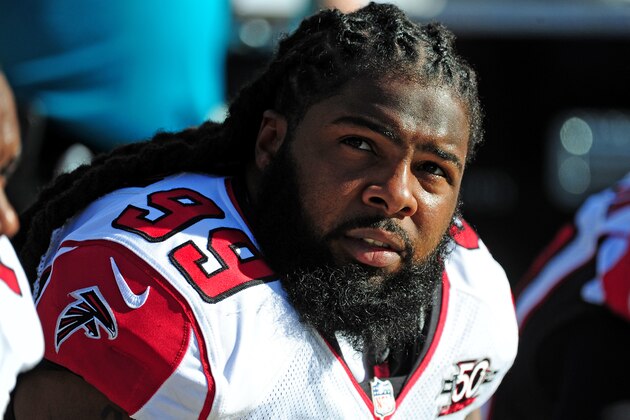 CHARLOTTE, NC - DECEMBER 13: Adrian Clayborn #99 of the Atlanta Falcons watches the action against the Carolina Panthers at Bank Of America Stadium on December 13, 2015 in Charlotte, North Carolina. (Photo by Scott Cunningham/Getty Images)