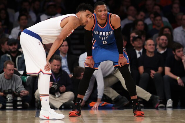 NEW YORK, NY - NOVEMBER 28:  Russell Westbrook #0 of the Oklahoma City Thunder and Courtney Lee #5 of the New York Knicks look on during the first half at Madison Square Garden on November 28, 2016 in New York City. NOTE TO USER: User expressly acknowledges and agrees that, by downloading and or using this photograph, User is consenting to the terms and conditions of the Getty Images License Agreement.  (Photo by Michael Reaves/Getty Images)