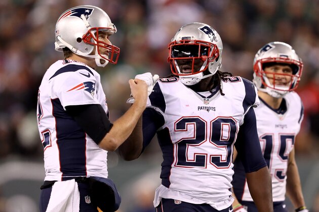 EAST RUTHERFORD, NJ - NOVEMBER 27:  Tom Brady #12 of the New England Patriots celebrates with LeGarrette Blount #29 after a first down against the New York Jets during the second half in the game at MetLife Stadium on November 27, 2016 in East Rutherford, New Jersey.  (Photo by Elsa/Getty Images)