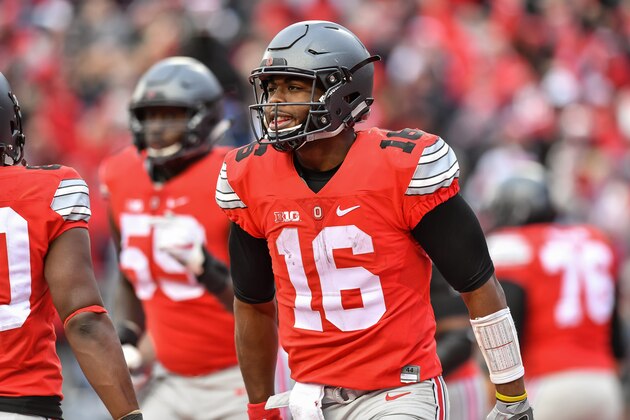 COLUMBUS, OH - NOVEMBER 26:  Quarterback J.T. Barrett #16 of the Ohio State Buckeyes celebrates after scoring against the Michigan Wolverines at Ohio Stadium on November 26, 2016 in Columbus, Ohio. Ohio State defeated Michigan 30-27 in two overtimes.  (Photo by Jamie Sabau/Getty Images)