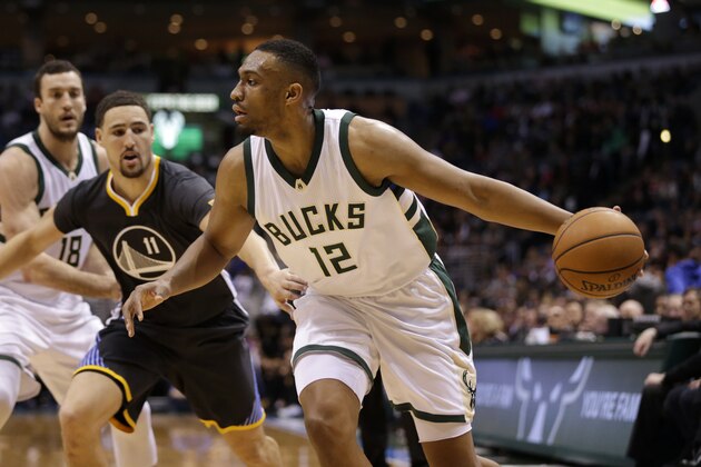 MILWAUKEE, WI - NOVEMBER 19: Jabari Parker #12 of the Milwaukee Bucks dribbles the basketball during the game against the Golden State Warriors at BMO Harris Bradley Center on November 19, 2016 in Milwaukee, Wisconsin. NOTE TO USER: User expressly acknowledges and agrees that, by downloading and or using this photograph, User is consenting to the terms and conditions of the Getty Images License Agreement. (Photo by Mike McGinnis/Getty Images)