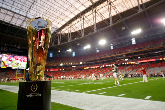 GLENDALE, AZ - JANUARY 11:  The College Football Playoff National Championship Trophy is seen on the field before the 2016 College Football Playoff National Championship Game between the Clemson Tigers and the Alabama Crimson Tide at University of Phoenix Stadium on January 11, 2016 in Glendale, Arizona.  (Photo by Kevin C. Cox/Getty Images)