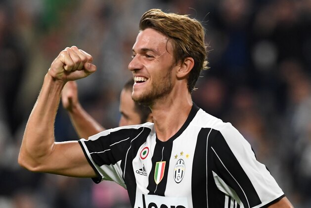 TURIN, ITALY - SEPTEMBER 21:  Daniele Rugani of Juventus FC celebrates after scoring the opening goal during the Serie A match between Juventus FC and Cagliari Calcio at Juventus Stadium on September 21, 2016 in Turin, Italy.  (Photo by Valerio Pennicino/Getty Images)