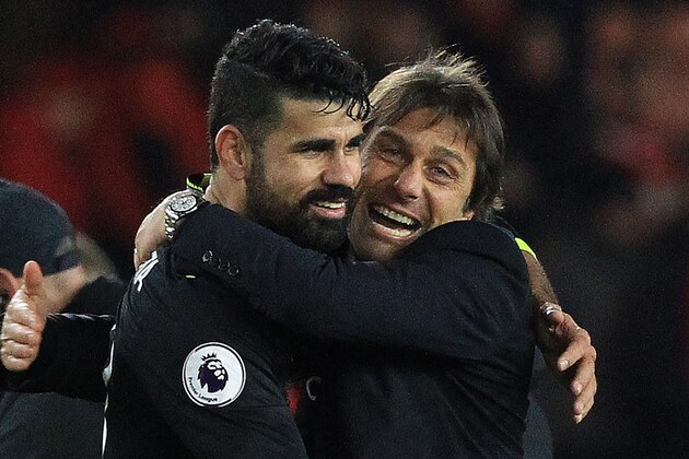 Chelsea's Italian head coach Antonio Conte (R) reacts as he congratulates Chelsea's Brazilian-born Spanish striker Diego Costa following the English Premier League football match between Middlesbrough and Cheslea at Riverside Stadium in Middlesbrough, northeast England on November 20, 2016.
Chelsea won the match 1-0. / AFP / Lindsey PARNABY / RESTRICTED TO EDITORIAL USE. No use with unauthorized audio, video, data, fixture lists, club/league logos or 'live' services. Online in-match use limited to 75 images, no video emulation. No use in betting, games or single club/league/player publications.  /         (Photo credit should read LINDSEY PARNABY/AFP/Getty Images)