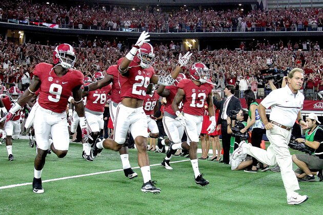 ARLINGTON, TX - SEPTEMBER 03:  Head coach Nick Saban of the Alabama Crimson Tide takes his team to the field against the USC Trojan during the AdvoCare Classic at AT&T Stadium on September 3, 2016 in Arlington, Texas.  (Photo by Leon Bennett/Getty Images)