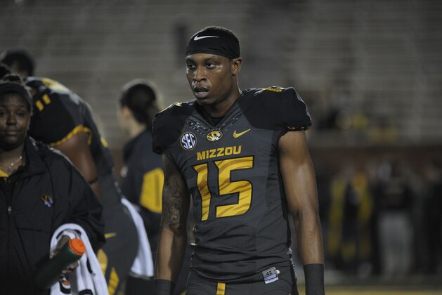 COLUMBIA , MO - NOVEMBER 5:  Keyon Dilosa #15 of the Missouri Tigers warms up prior to a game against the Mississippi State Bulldogs at Memorial Stadium on November 5, 2015 in Columbia, Missouri. (Photo by Ed Zurga/Getty Images)