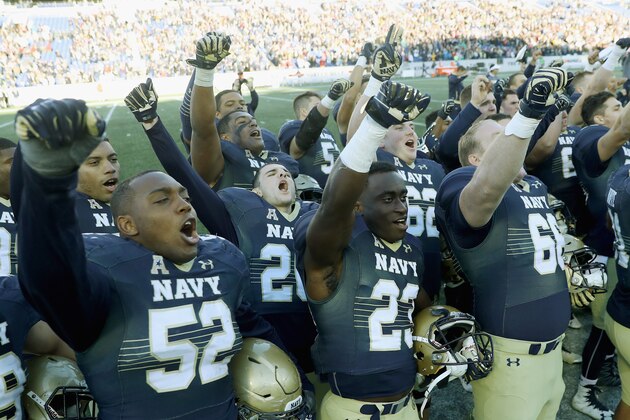 ANNAPOLIS, MD - NOVEMBER 12: Members of the Navy Midshipmen celebrate following their 42-40 win over the Tulsa Golden Hurricane at Navy-Marine Corps Memorial Stadium on November 12, 2016 in Annapolis, Maryland. (Photo by Rob Carr/Getty Images) ANNAPOLIS, MD - NOVEMBER 12: Members of the Navy Midshipmen celebrate following their 42-40 win over the Tulsa Golden Hurricane at Navy-Marine Corps Memorial Stadium on November 12, 2016 in Annapolis, Maryland. (Photo by Rob Carr/Getty Images)