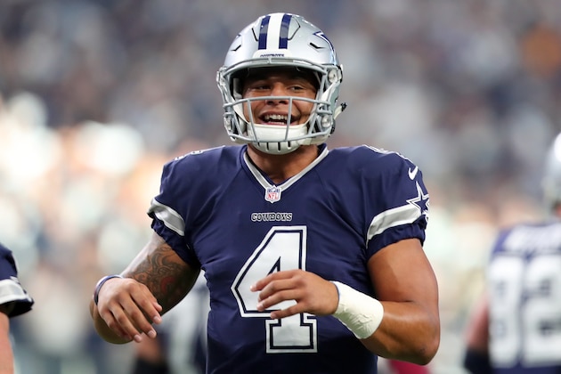 ARLINGTON, TX - NOVEMBER 24:   Dak Prescott #4 of the Dallas Cowboys celebrates after a touchdown during the first quarter against the Washington Redskins at AT&T Stadium on November 24, 2016 in Arlington, Texas.  (Photo by Tom Pennington/Getty Images)