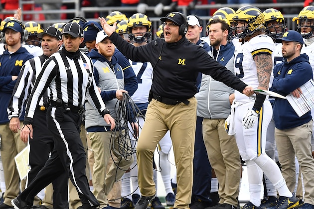 COLUMBUS, OH - NOVEMBER 26:   Head coach Jim Harbaugh of the Michigan Wolverines argues a call on the sideline during the second half against the Ohio State Buckeyes at Ohio Stadium on November 26, 2016 in Columbus, Ohio.  (Photo by Jamie Sabau/Getty Images)