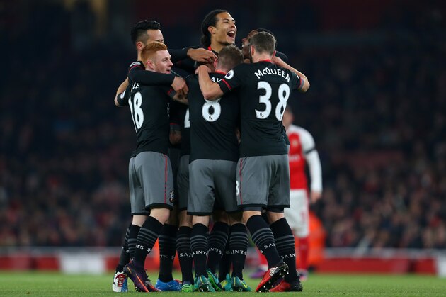 LONDON, ENGLAND - NOVEMBER 30: Virgil van Dijk of Southampton joins in the celebrations as Jordy Clasie of Southampton is mobbed by his team mates after he scores to make it 0-1 during the EFL Quarter Final Cup match between Arsenal and Southampton at Emirates Stadium on November 30, 2016 in London, England. (Photo by Catherine Ivill - AMA/Getty Images)