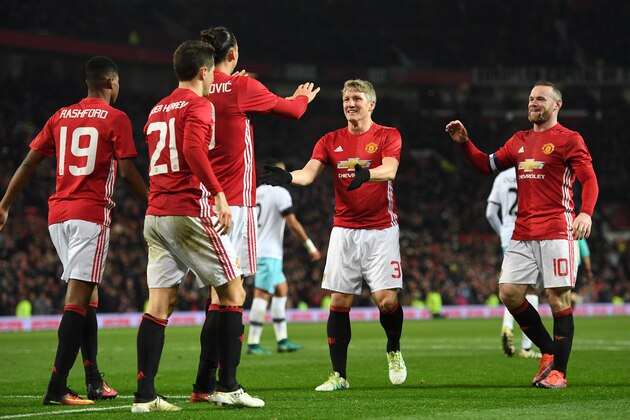 MANCHESTER, ENGLAND - NOVEMBER 30: Zlatan Ibrahimovic of Manchester United clebrates with team mates after scoring his team's fourth goal of the game during the EFL Cup quarter final match between Manchester United and West Ham United at Old Trafford on November 30, 2016 in Manchester, England.  (Photo by Shaun Botterill/Getty Images)