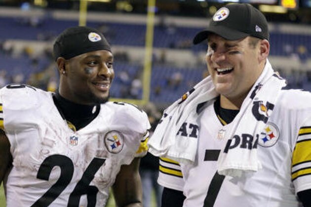 FILE - In this Nov. 24, 2016, file photo, Pittsburgh Steelers quarterback Ben Roethlisberger (7) and running back Le'Veon Bell (26) talk following an NFL football game against the Indianapolis Colts, in Indianapolis. Four years in, Roethlisberger is still waiting for running back Le'Veon Bell to get tired. Bell's versatility and seemingly eternally fresh legs have made him indespensible to Pittsburgh's offense, one of the reasons Roethlisberger calls Bell the best back in the NFL.  (AP Photo/Michael Conroy, File)