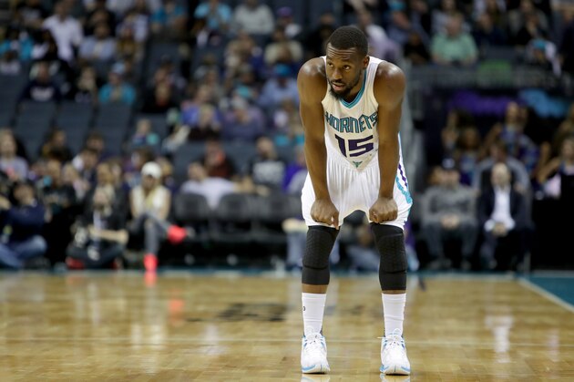 CHARLOTTE, NC - NOVEMBER 29:  Kemba Walker #15 of the Charlotte Hornets watches on during their game against the Detroit Pistons at Spectrum Center on November 29, 2016 in Charlotte, North Carolina. NOTE TO USER: User expressly acknowledges and agrees that, by downloading and or using this photograph, User is consenting to the terms and conditions of the Getty Images License Agreement.  (Photo by Streeter Lecka/Getty Images)