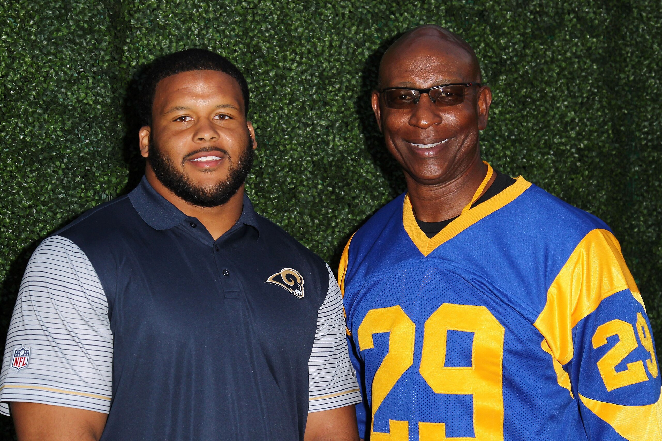 LOS ANGELES, CA - JUNE 16: Defensive tackle Aaron Donald #99 of the Los Angeles Rams and Former NFL player Eric Dickerson attend LASEC Hosts NFL All-Access With The Los Angeles Rams at Los Angeles Memorial Coliseum on June 16, 2016 in Los Angeles, California. (Photo by Leon Bennett/Getty Images) LOS ANGELES, CA - JUNE 16: Defensive tackle Aaron Donald #99 of the Los Angeles Rams and Former NFL player Eric Dickerson attend LASEC Hosts NFL All-Access With The Los Angeles Rams at Los Angeles Memorial Coliseum on June 16, 2016 in Los Angeles, California. (Photo by Leon Bennett/Getty Images)