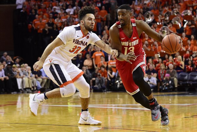 CHARLOTTESVILLE, VA - NOVEMBER 30: JaQuan Lyle #13 of the Ohio State Buckeyes drives against London Perrantes #32 of the Virginia Cavaliers in the first half during a game at John Paul Jones Arena on November 30, 2016 in Charlottesville, Virginia. (Photo by Patrick McDermott/Getty Images)