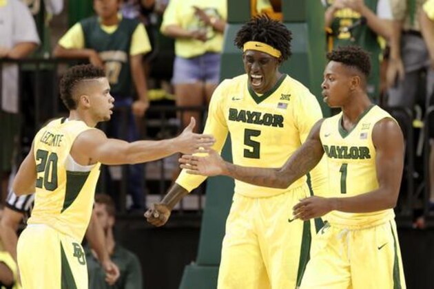 Baylor's Manu Lecomte (20), Wendell Mitchell (1) and Johnathan Motley (5) celebrate in the second half of an NCAA college basketball game against Oregon on Tuesday Nov. 15, 2016, in Waco, Texas. Unranked Baylor beat No. 4 Oregon 66-49. (AP Photo/Tony Gutierrez)