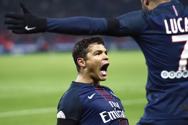 Paris Saint-Germain's Brazilian defender Thiago Silva celebrates after scoring during the French L1 football match between Paris Saint-Germain and Angers at the Parc des Princes stadium in Paris on November 30, 2016.  / AFP / MIGUEL MEDINA        (Photo credit should read MIGUEL MEDINA/AFP/Getty Images)