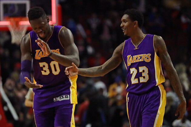 CHICAGO, IL - NOVEMBER 30: Julius Randle #30 and Louis Williams #23 of the Los Angeles Lakers celebrate a win over the Chicago Bulls at the United Center on November 30, 2016 in Chicago, Illinois. The Lakers defeated the Bulls 96-90. (Photo by Jonathan Daniel/Getty Images)