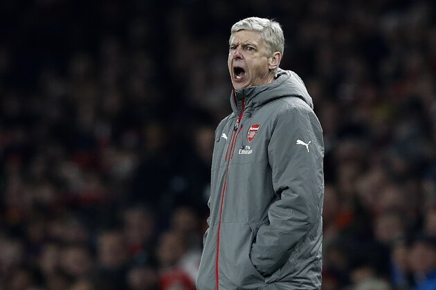 Arsenal's French manager Arsene Wenger shouts instructions to his players from the touchline during the EFL (English Football League) Cup quarter-final football match between Arsenal and Southampton at the Emirates Stadium in London on November 30, 2016.  / AFP / Adrian DENNIS / RESTRICTED TO EDITORIAL USE. No use with unauthorized audio, video, data, fixture lists, club/league logos or 'live' services. Online in-match use limited to 75 images, no video emulation. No use in betting, games or single club/league/player publications.  /         (Photo credit should read ADRIAN DENNIS/AFP/Getty Images)