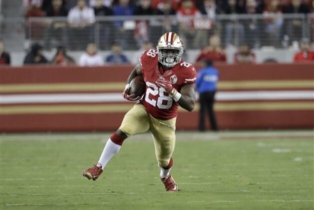 San Francisco 49ers running back Carlos Hyde (28) runs against the Los Angeles Rams during an NFL football game in Santa Clara, Calif., Monday, Sept. 12, 2016. (AP Photo/Marcio Jose Sanchez)