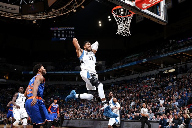 MINNEAPOLIS, MN - NOVEMBER 30: Karl-Anthony Towns #32 of the Minnesota Timberwolves goes for the dunk during the game against the New York Knicks on November 30, 2016 at Target Center in Minneapolis, Minnesota. NOTE TO USER: User expressly acknowledges and agrees that, by downloading and or using this Photograph, user is consenting to the terms and conditions of the Getty Images License Agreement. Mandatory Copyright Notice: Copyright 2016 NBAE (Photo by David Sherman/NBAE via Getty Images)