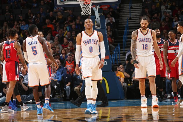 OKLAHOMA CITY, OK - NOVEMBER 30:  Russell Westbrook #0 and Steven Adams #12 of the Oklahoma City Thunder are seen during the game against the Washington Wizards on November 30, 2016 at Chesapeake Energy Arena in Oklahoma City, Oklahoma. At 2:00 left in the 4th quarter, the Thunders Russell Westbrook recorded his 4th straight triple double (18 points, 12 rebounds, 10 assists). NOTE TO USER: User expressly acknowledges and agrees that, by downloading and or using this photograph, User is consenting to the terms and conditions of the Getty Images License Agreement. Mandatory Copyright Notice: Copyright 2016 NBAE (Photo by Layne Murdoch/NBAE via Getty Images)