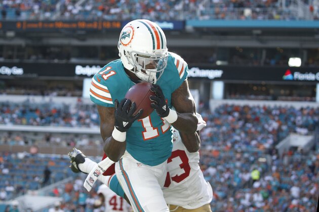 MIAMI GARDENS, FL - NOVEMBER 27: DeVante Parker #11 of the Miami Dolphins catches the ball in the end zone against the San Francisco 49ers on November 27, 2016 at Hard Rock Stadium in Miami Gardens, Florida. The pass was ruled incomplete. The Dolphins defeated the 49ers 31-24. (Photo by Joel Auerbach/Getty Images)