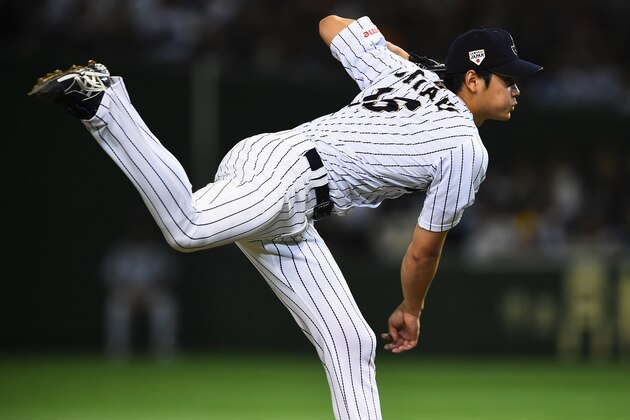 TOKYO, JAPAN - NOVEMBER 19:  Starting pitcher Shohei Otani #16 of Japan throws in the top of seventh inning during the WBSC Premier 12 semi final match between South Korea and Japan at the Tokyo Dome on November 19, 2015 in Tokyo, Japan.  (Photo by Masterpress/Getty Images)