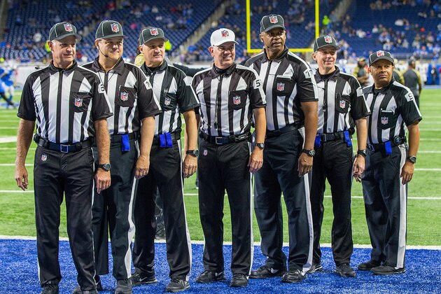 DETROIT, MI - NOVEMBER 20: From L to R, Side Judge Gary Cavaletto #60, Umpire Bruce Stritesky #102, Line Judge Mark Perlman #9, Referee Bill Vinovich #52 (white hat), Head Linesman Phil McKinnely #110, Back Judge Greg Meyer #78 and Field Judge James Coleman #95 pose for a quick picture before an NFL game between the Detroit Lions and the Jacksonville Jaguars at Ford Field on November 20, 2016 in Detroit, Michigan. The Lions defeated the Jaguars 26-19. (Photo by Dave Reginek/Getty Images)