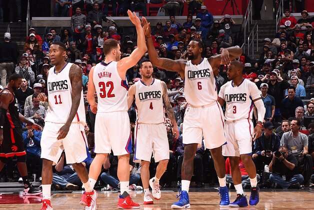 LOS ANGELES, CA - NOVEMBER 21:Jamal Crawford #11, Blake Griffin #32, DeAndre Jordan #6 and Chris Paul #3 of the LA Clippers show emotion during the game against the Toronto Raptors at STAPLES Center on November 21, 2016 in Los Angeles, California. NOTE TO USER: User expressly acknowledges and agrees that, by downloading and/or using this Photograph, user is consenting to the terms and conditions of the Getty Images License Agreement. Mandatory Copyright Notice: Copyright 2016 NBAE (Photo by Andrew D. Bernstein/NBAE via Getty Images)