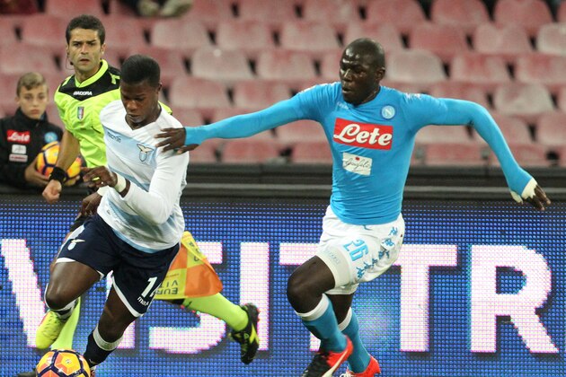 Lazio's forward from Senegal Keita fights for the ball with Napoli's defender from France Kalidou Koulibaly during the Italian Serie A football match SSC Napoli vs SS Lazio on November 5, 2016, at the San Paolo Stadium in Naples. / AFP / CARLO HERMANN        (Photo credit should read CARLO HERMANN/AFP/Getty Images)