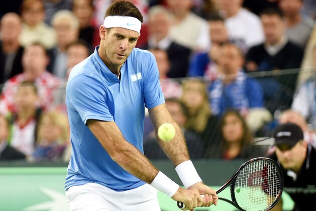Argentina's tennis player Juan Martin del Potro returns the ball to Croatia's tennis player Marin Cilic during the Davis Cup World Group final singles match between Croatia and Argentina at the Arena hall in Zagreb on November 27, 2016. / AFP / -        (Photo credit should read -/AFP/Getty Images)