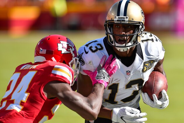 KANSAS CITY, MO - OCTOBER 23: Wide receiver Michael Thomas #13 of the New Orleans Saints begins to be tackled by cornerback D.J. White #24 of the Kansas City Chiefs at Arrowhead Stadium during the fourth quarter of the game on October 23, 2016 in Kansas City, Missouri. (Photo by Jason Hanna/Getty Images)