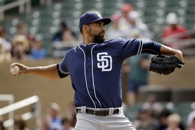 San Diego Padres starting pitcher Tyson Ross throws against the Colorado Rockies during first inning of a spring baseball game in Scottsdale, Ariz., Saturday, March 5, 2016. (AP Photo/Chris Carlson)