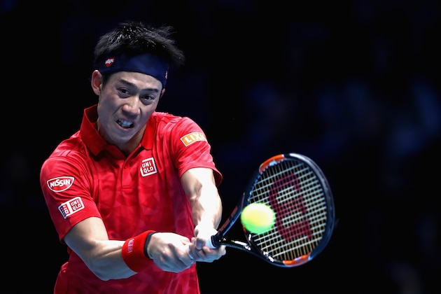 LONDON, ENGLAND - NOVEMBER 19:  Kei Nishikori of Japan plays a backhand shot  during his men's singles semi final against Novak Djokovic of Serbia on day seven of the ATP World Tour Finals at O2 Arena on November 19, 2016 in London, England.  (Photo by Julian Finney/Getty Images)