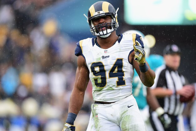 LOS ANGELES, CA - NOVEMBER 20:  Robert Quinn #94 of the Los Angeles Rams celebrates a sack during the second quarter of the game against the Miami Dolphins at Los Angeles Coliseum on November 20, 2016 in Los Angeles, California.  (Photo by Harry How/Getty Images)