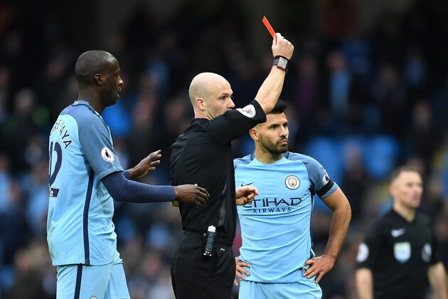 MANCHESTER, ENGLAND - DECEMBER 03: Sergio Aguero (R) of Manchester City is shown a red card by referee Anthony Taylor after fouling David Luiz of Chelsea during the Premier League match between Manchester City and Chelsea at Etihad Stadium on December 3, 2016 in Manchester, England.  (Photo by Laurence Griffiths/Getty Images)