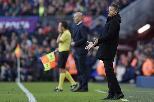 Barcelona's coach Luis Enrique gestures from the sideline during the Spanish league football match FC Barcelona vs Real Madrid CF at the Camp Nou stadium in Barcelona on December 3, 2016. / AFP / LLUIS GENE        (Photo credit should read LLUIS GENE/AFP/Getty Images)