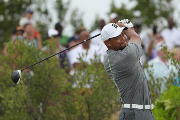 NASSAU, BAHAMAS - DECEMBER 03:  Tiger Woods of the United States hits his tee shot on the first hole during round three of the Hero World Challenge at Albany, The Bahamas on December 3, 2016 in Nassau, Bahamas.  (Photo by Christian Petersen/Getty Images)