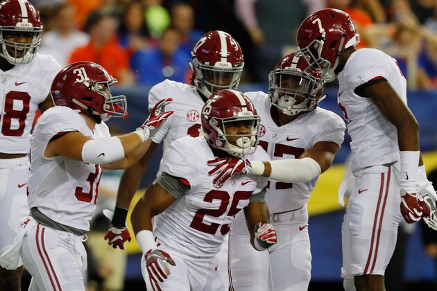 ATLANTA, GA - DECEMBER 03:  Joshua Jacobs #25 of the Alabama Crimson Tide celebrates with teammates after returning a blocked punt for a touchdown in the first quarter against the Florida Gators during the SEC Championship game at the Georgia Dome on December 3, 2016 in Atlanta, Georgia.  (Photo by Kevin C. Cox/Getty Images)