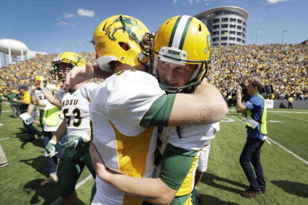 FILE - In this Saturday, Sept. 17, 2016, file photo, North Dakota State kicker Cam Pedersen, right, celebrates with teammate James Fisher after kicking a game-winning 37-yard field goal on the final play of an NCAA college football game against Iowa in Iowa City, Iowa. North Dakota State won 23-21. (AP Photo/Charlie Neibergall)