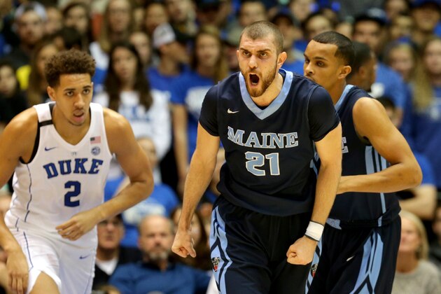 DURHAM, NC - DECEMBER 03:  Ilker Er #21 of the Maine Black Bears reacts after a basket against the Duke Blue Devils during their game at Cameron Indoor Stadium on December 3, 2016 in Durham, North Carolina.  (Photo by Streeter Lecka/Getty Images)