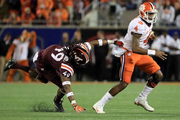 ORLANDO, FL - DECEMBER 03:  Deshaun Watson #4 of the Clemson Tigers rushes during the ACC Championship against the Virginia Tech Hokies on December 3, 2016 in Orlando, Florida.  (Photo by Mike Ehrmann/Getty Images)