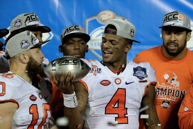 ORLANDO, FL - DECEMBER 03:  Deshaun Watson #4 of the Clemson Tigers holds the championship trophy following the ACC Championship game against the Virginia Tech Hokies on December 3, 2016 in Orlando, Florida. The Clemson Tigers won the game 42-35.  (Photo by Sam Greenwood/Getty Images)