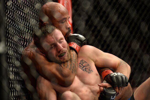 LAS VEGAS, NV - DECEMBER 03:  (L-R) Demetrious Johnson attempts to secure a rear choke submission against Timothy Elliott in their flyweight championship bout during The Ultimate Fighter Finale event inside the Pearl concert theater at the Palms Resort & Casino on December 3, 2016 in Las Vegas, Nevada. (Photo by Brandon Magnus/Zuffa LLC/Zuffa LLC via Getty Images)