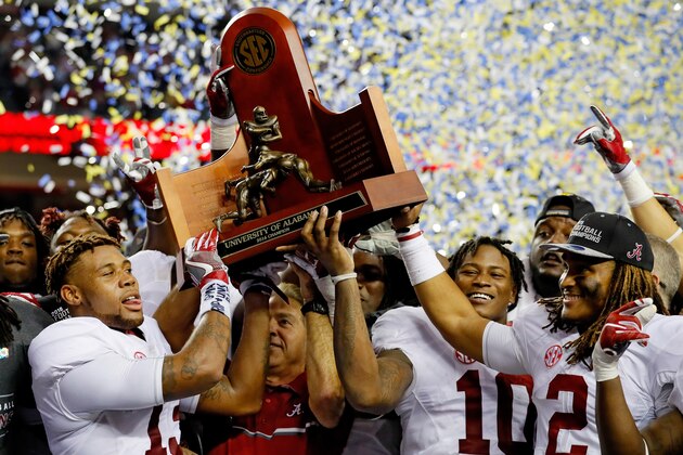 ATLANTA, GA - DECEMBER 03:  Head coach Nick Saban, Reuben Foster #10, Jalen Hurts #2 and ArDarius Stewart #13 of the Alabama Crimson Tide celebrate their 54 to 16 win over the Florida Gators during the SEC Championship game at the Georgia Dome on December 3, 2016 in Atlanta, Georgia.  (Photo by Kevin C. Cox/Getty Images)