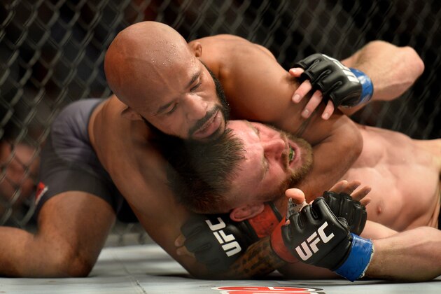 LAS VEGAS, NV - DECEMBER 03:  (L-R) Demetrious Johnson attempts to secure a rear choke submission against Timothy Elliott in their flyweight championship bout during The Ultimate Fighter Finale event inside the Pearl concert theater at the Palms Resort & Casino on December 3, 2016 in Las Vegas, Nevada. (Photo by Brandon Magnus/Zuffa LLC/Zuffa LLC via Getty Images)